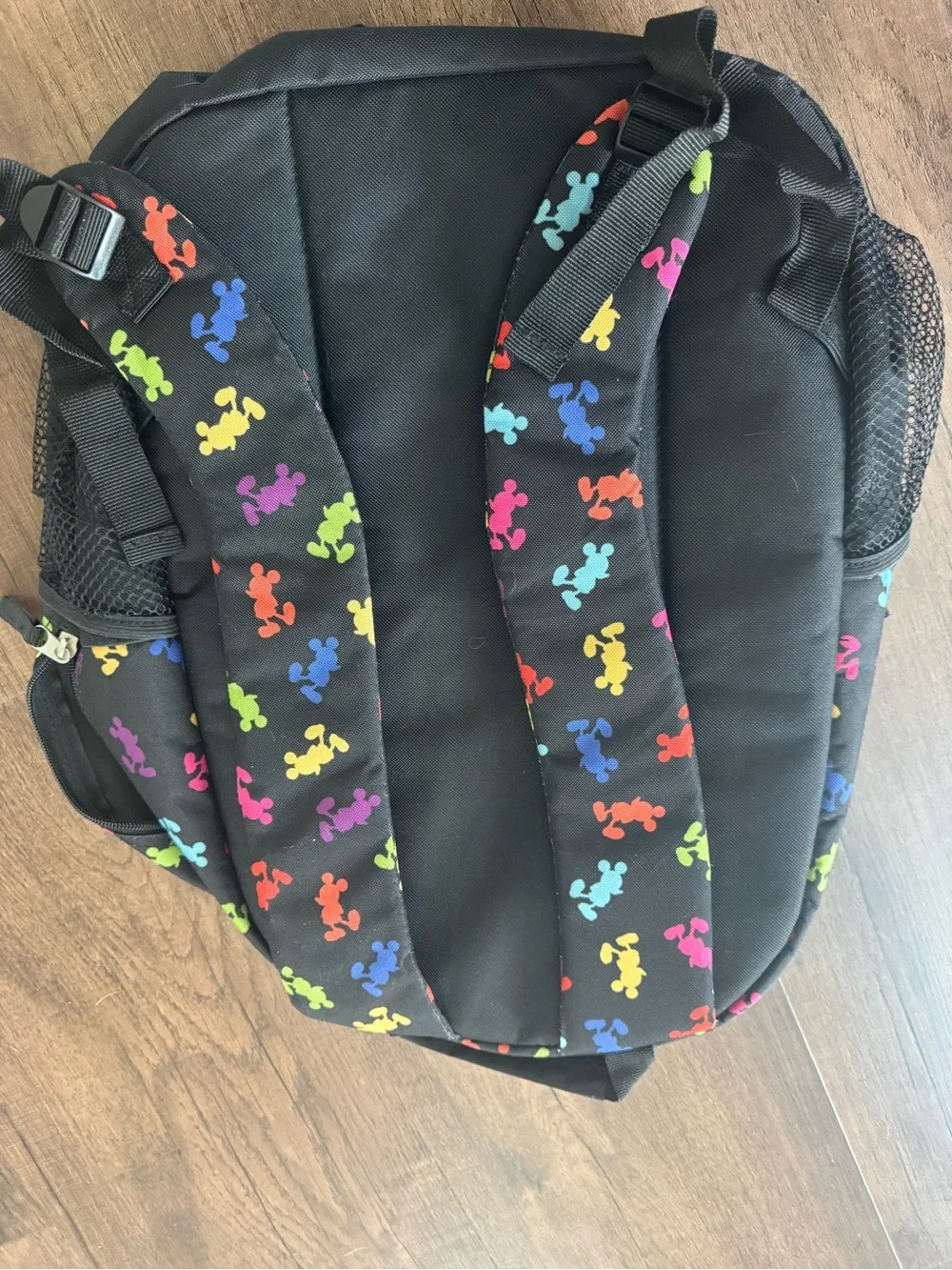 Disney park’s exclusive Black Backpack with Multi-Color Mickey Print